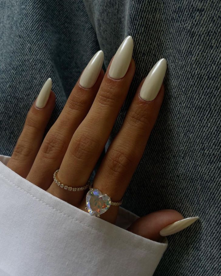 simple long shimmery white new years nails