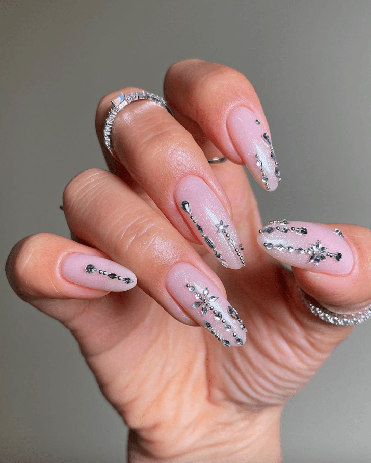 simple sparkly new years nails with 3D rhinestone designs