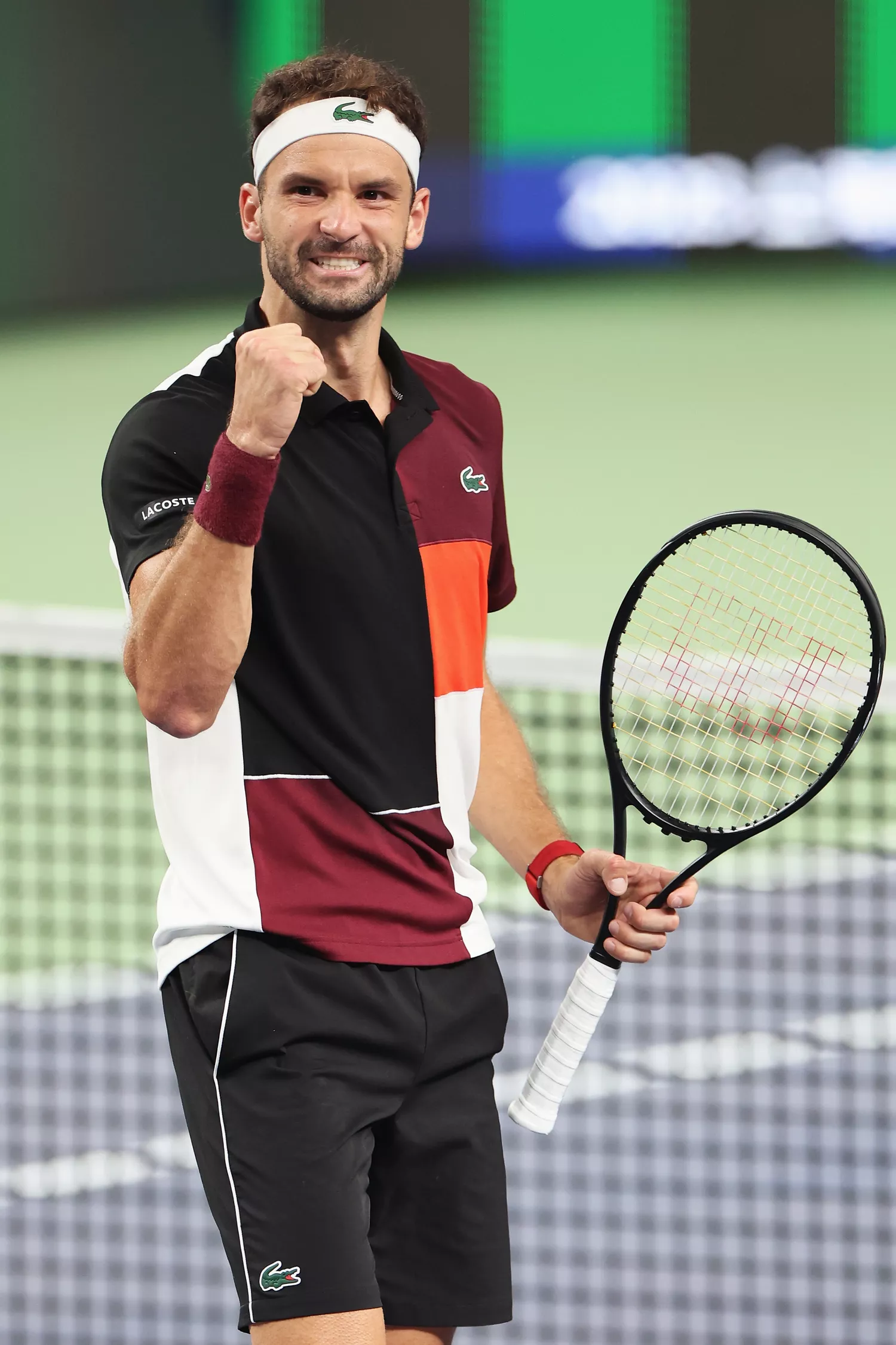 Grigor Dimitrov of Bulgaria celebrates victory in the Men's Singles Round of 16 match against Carlos Alcaraz of Spain on Day 10 of the 2023 Shanghai Rolex Masters at Qi Zhong Tennis Centre on October 11, 2023 in Shanghai, China