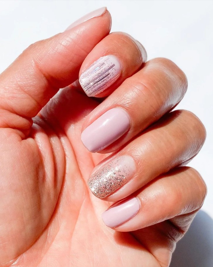 blush pink classy wedding nails with a sparkly glitter design