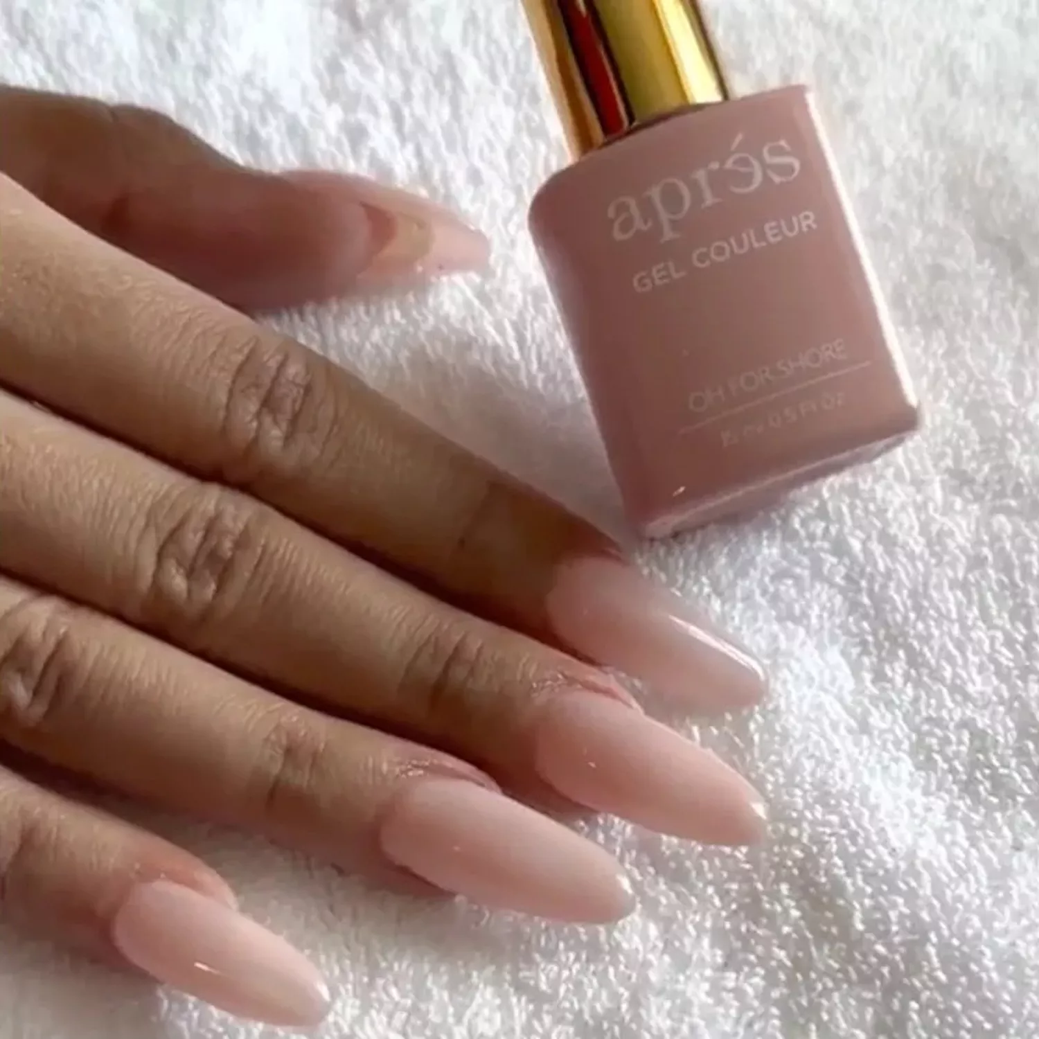 Close up of Cardi B with a strawberry milk manicure