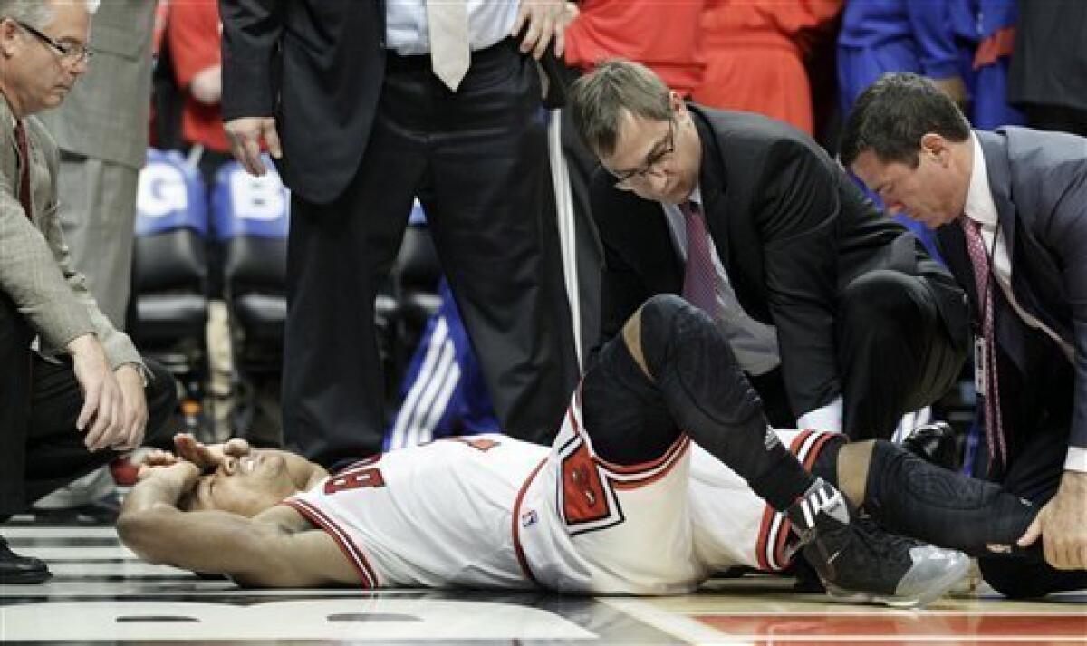 Bulls lose Rose to torn ACL in win over 76ers - The San Diego Union-Tribune