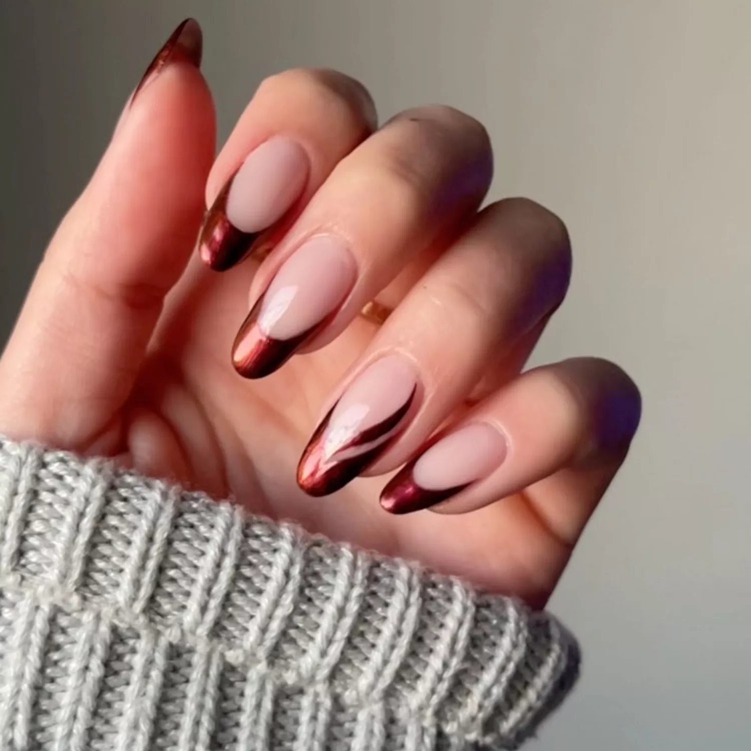 Burgundy Chrome French Tips - Byrdie Dark Nail Ideas