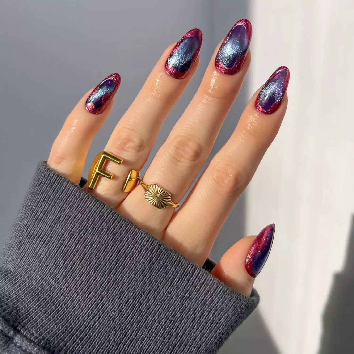 Burgundy and Slate Geode Nails - Byrdie Dark Nail Ideas