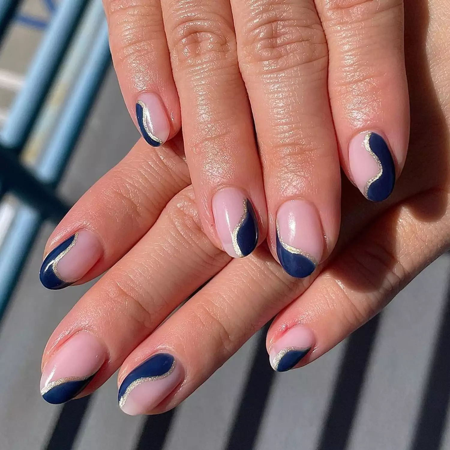 Dark Blue Swirl Nails - Byrdie Dark Nail Ideas