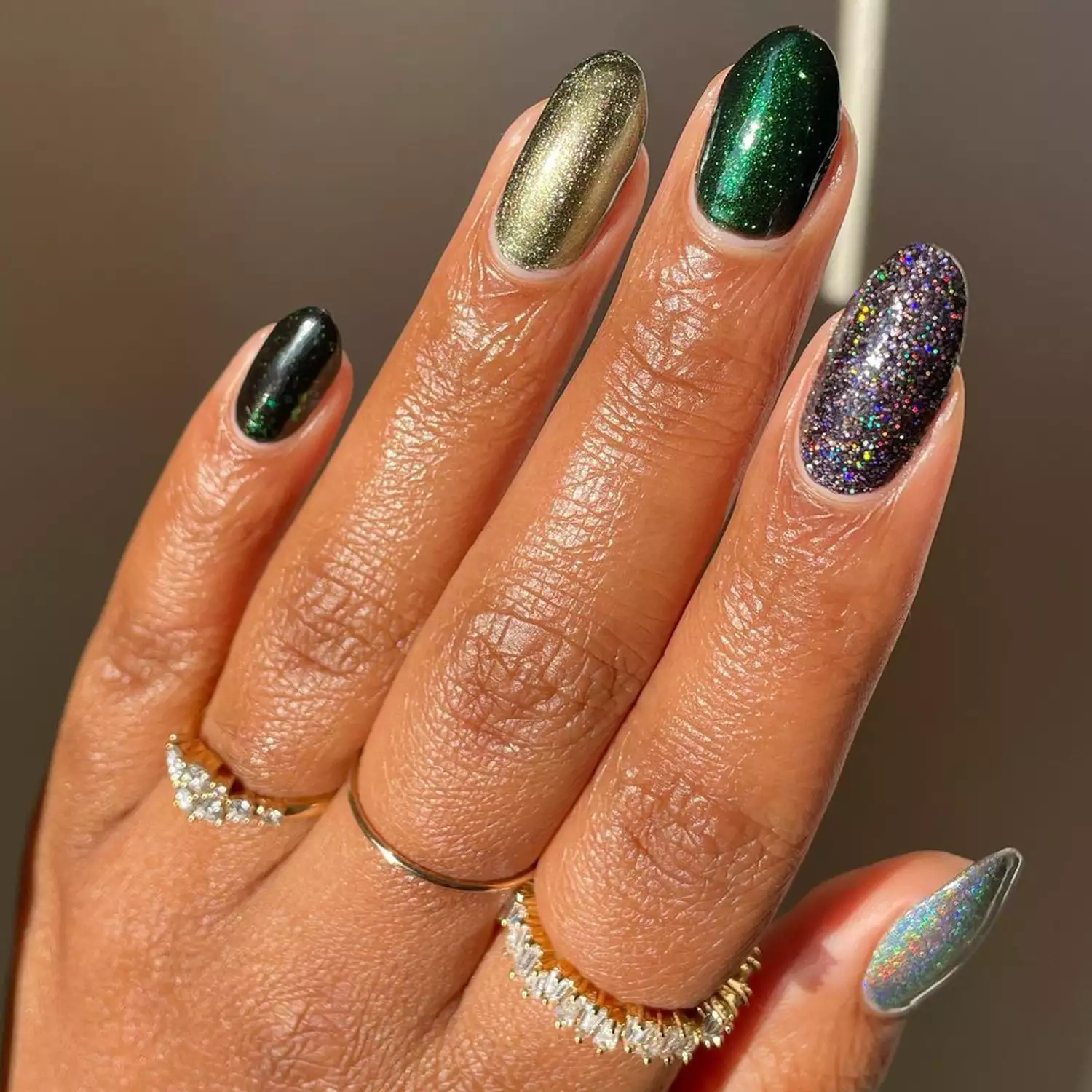 Mixed Glitter Nails - Byrdie Dark Nail Ideas