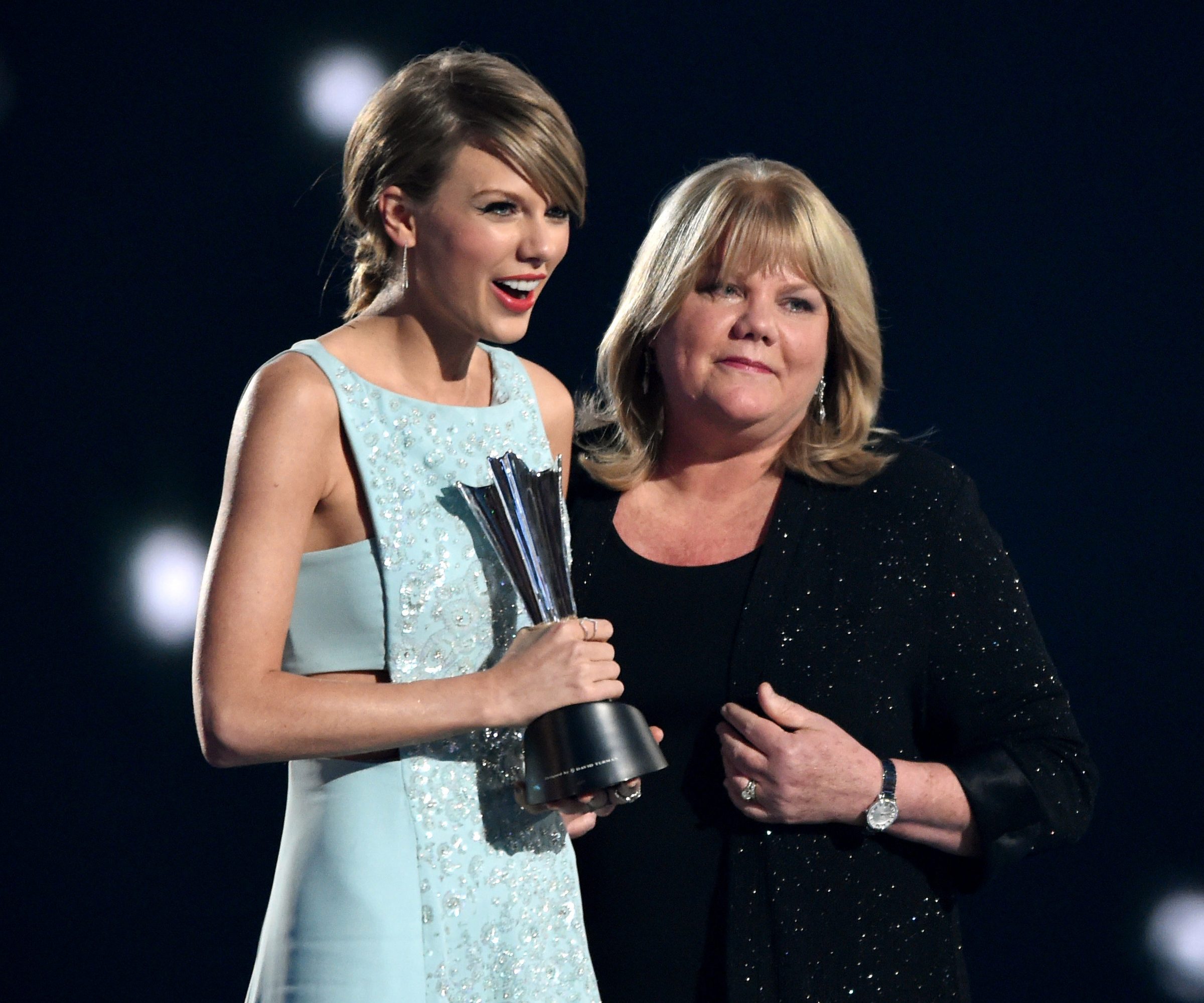 Taylor Swift has revealed that her mother Andrea has been diagnosed with a brain tumor as she battles breast cancer for a second time