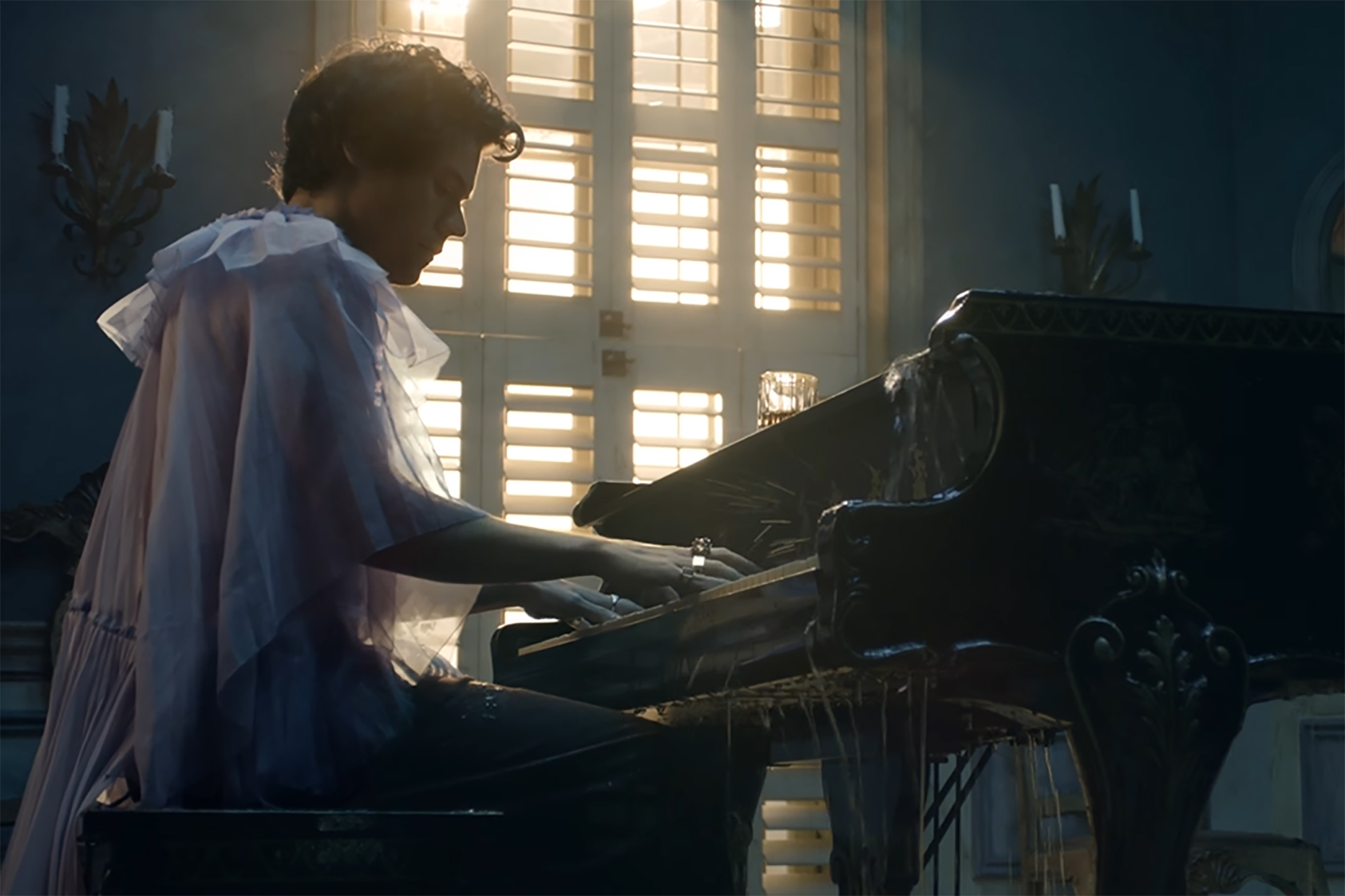 They pointed out Harry, 26, tinkling the ivories in his music video