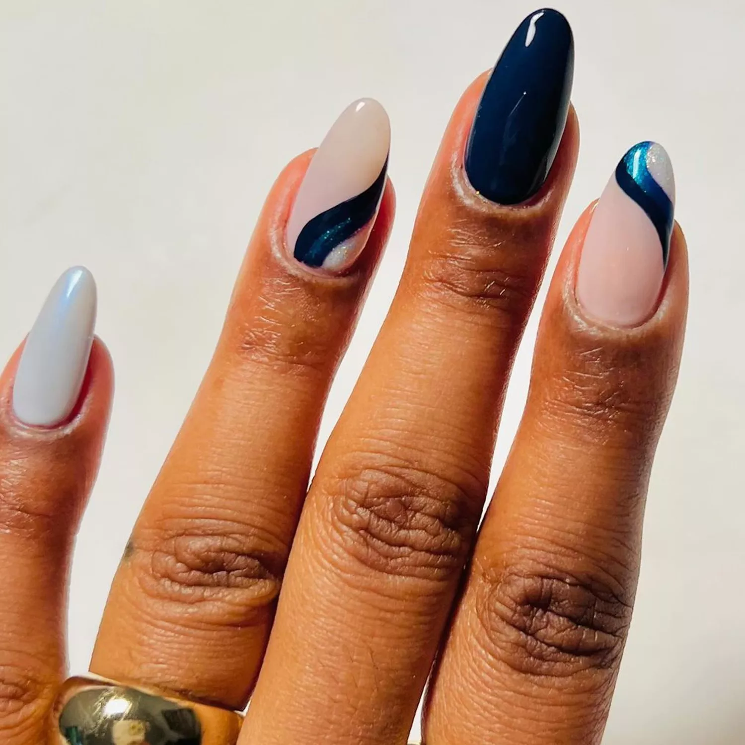 Navy Blue Accent Nails - Byrdie Dark Nail Ideas