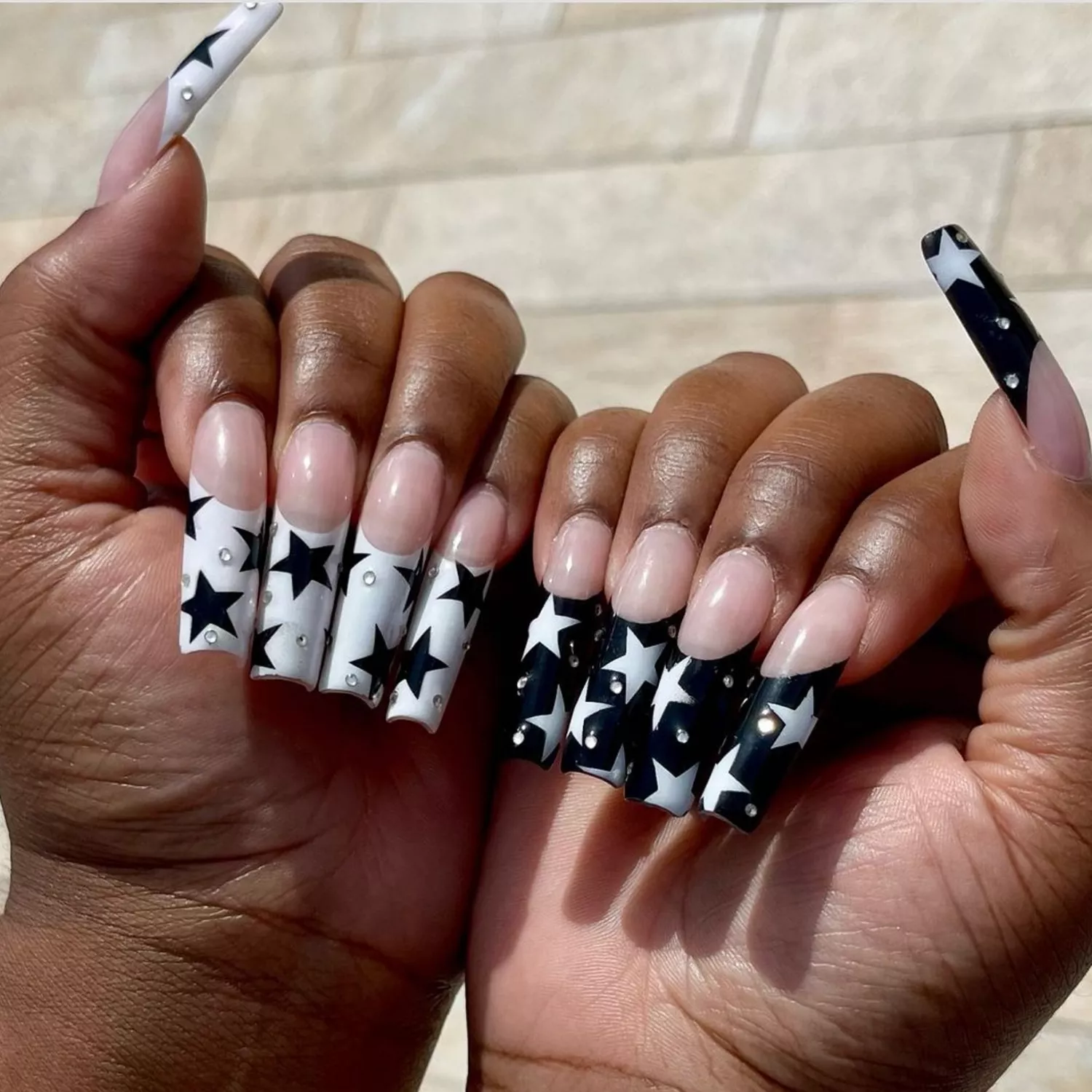 Long manicure with black and white stars