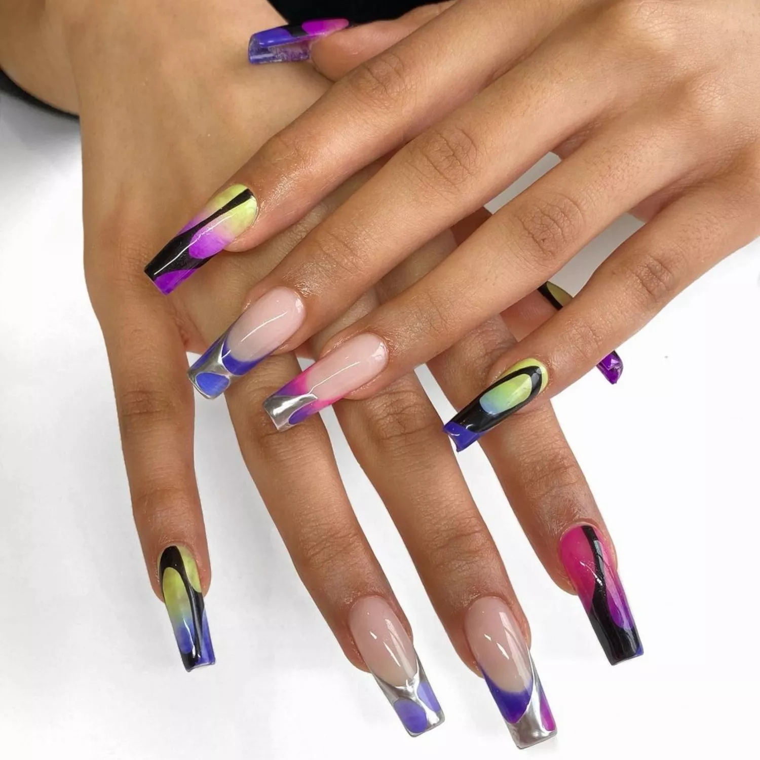 Bright colored abstract nails with silver