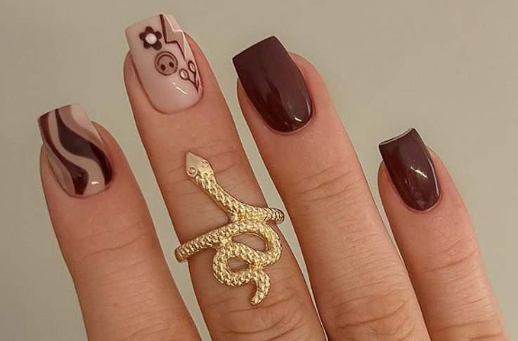 brown smiley face nail design