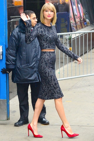 This image may contain Taylor Swift Clothing Apparel Human Person Footwear Shoe Jacket Coat Sleeve and Long Sleeve