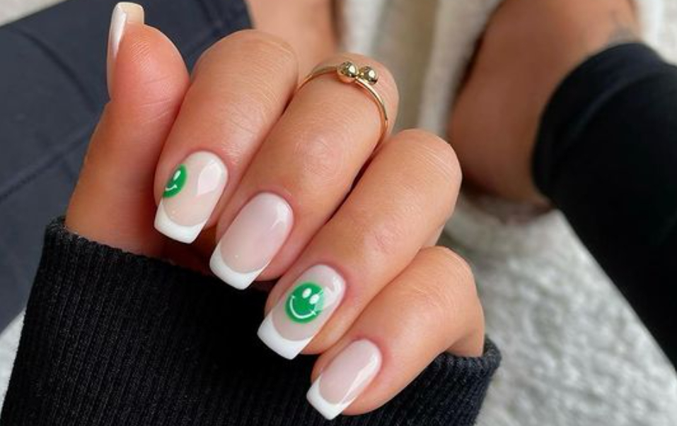 green smiley face nails design