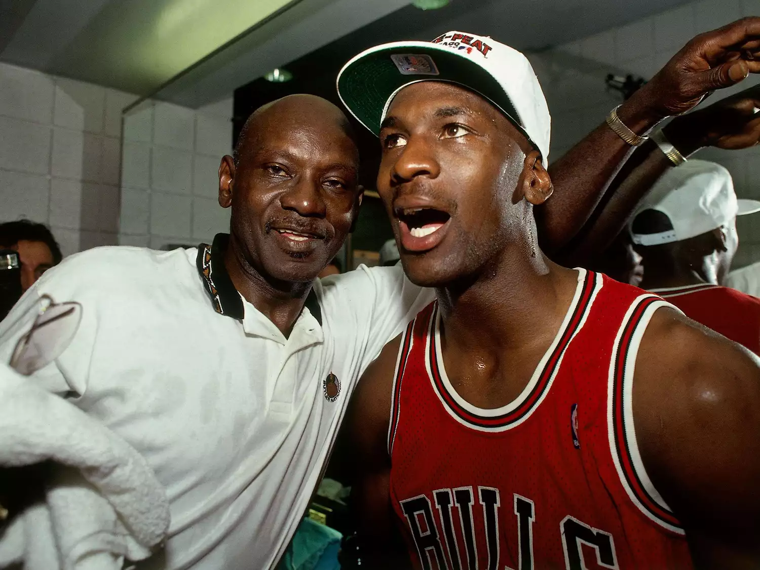 Michael Jordan #23 of the Chicago Bulls celebrates winning the NBA Championship with his father after Game Six of the 1993 NBA Finals on June 20, 1993 at th America West Arena in Phoenix, Arizona