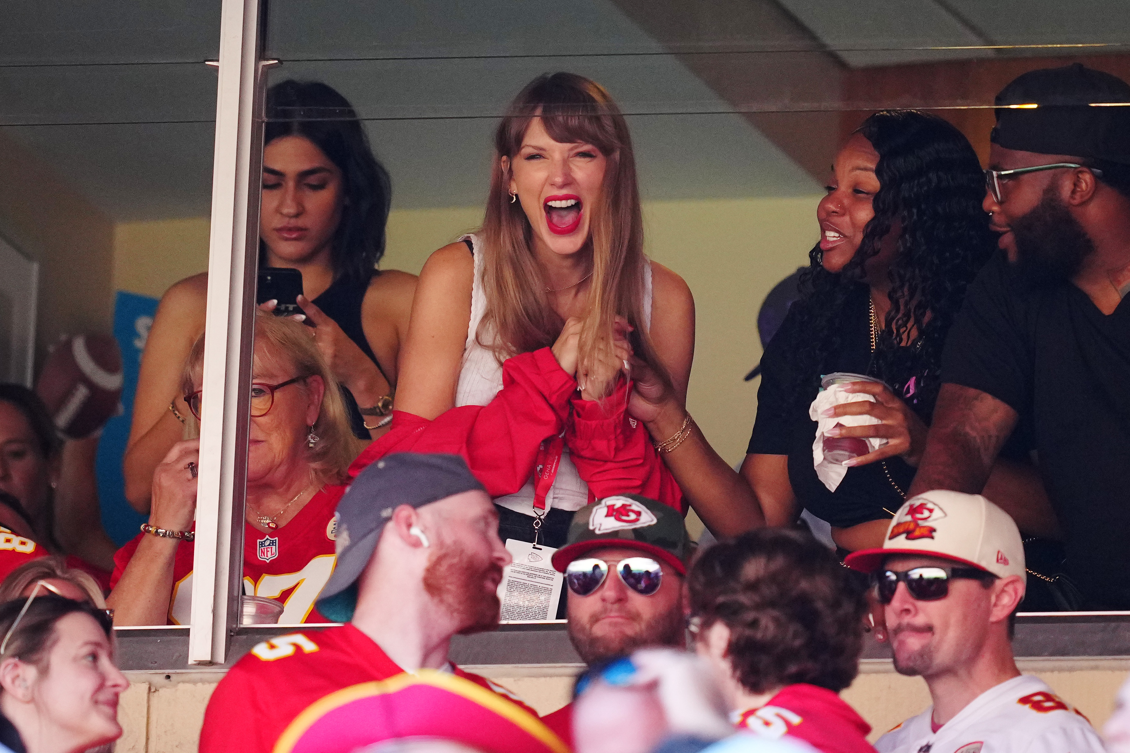 Taylor (seen here on September 24) has started to be a regular on the NFL sidelines