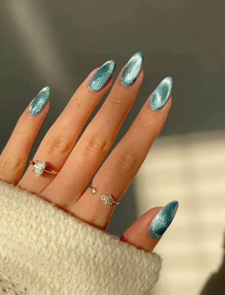 Light blue cat eye nails.