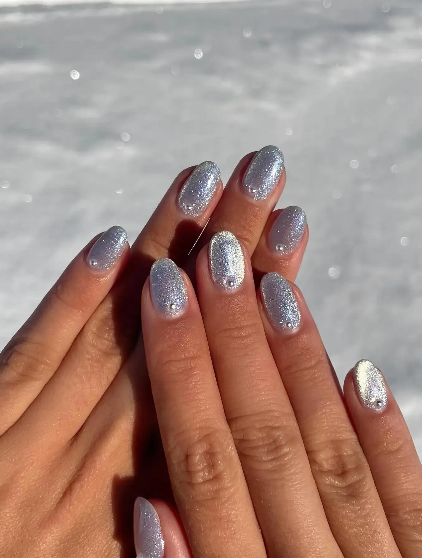 Short silver velvet nails.