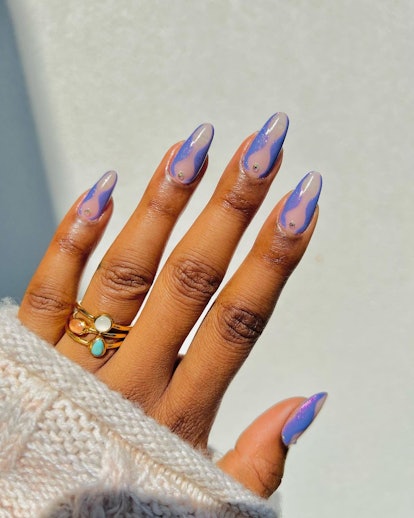 Purple hourglass nails are on-trend.