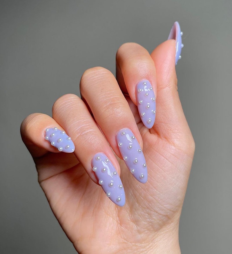 Purple nail art ideas that beautifully showcase the royal hue.