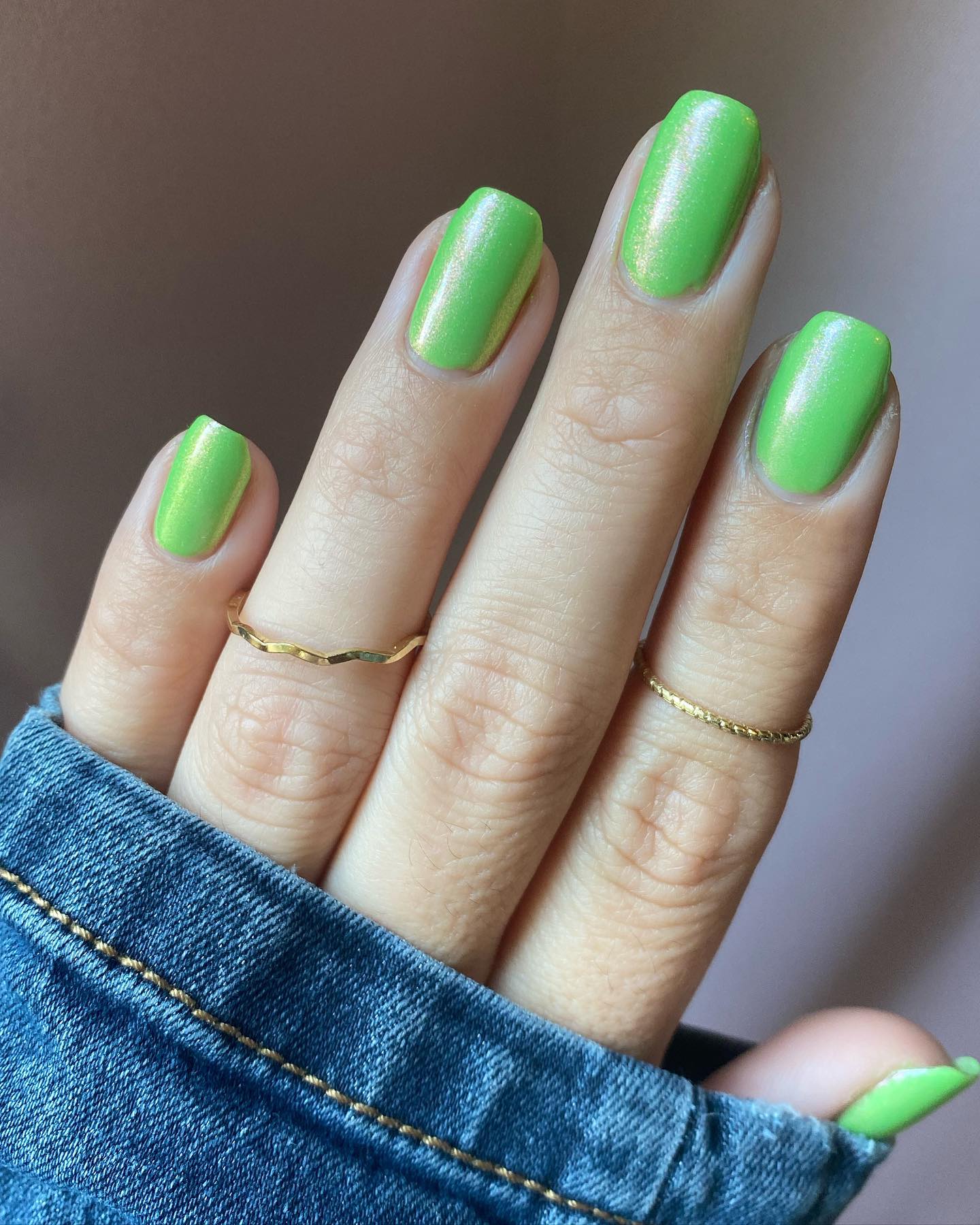 Simple and plain... With this light glittered green nails, you will be a classic chic.