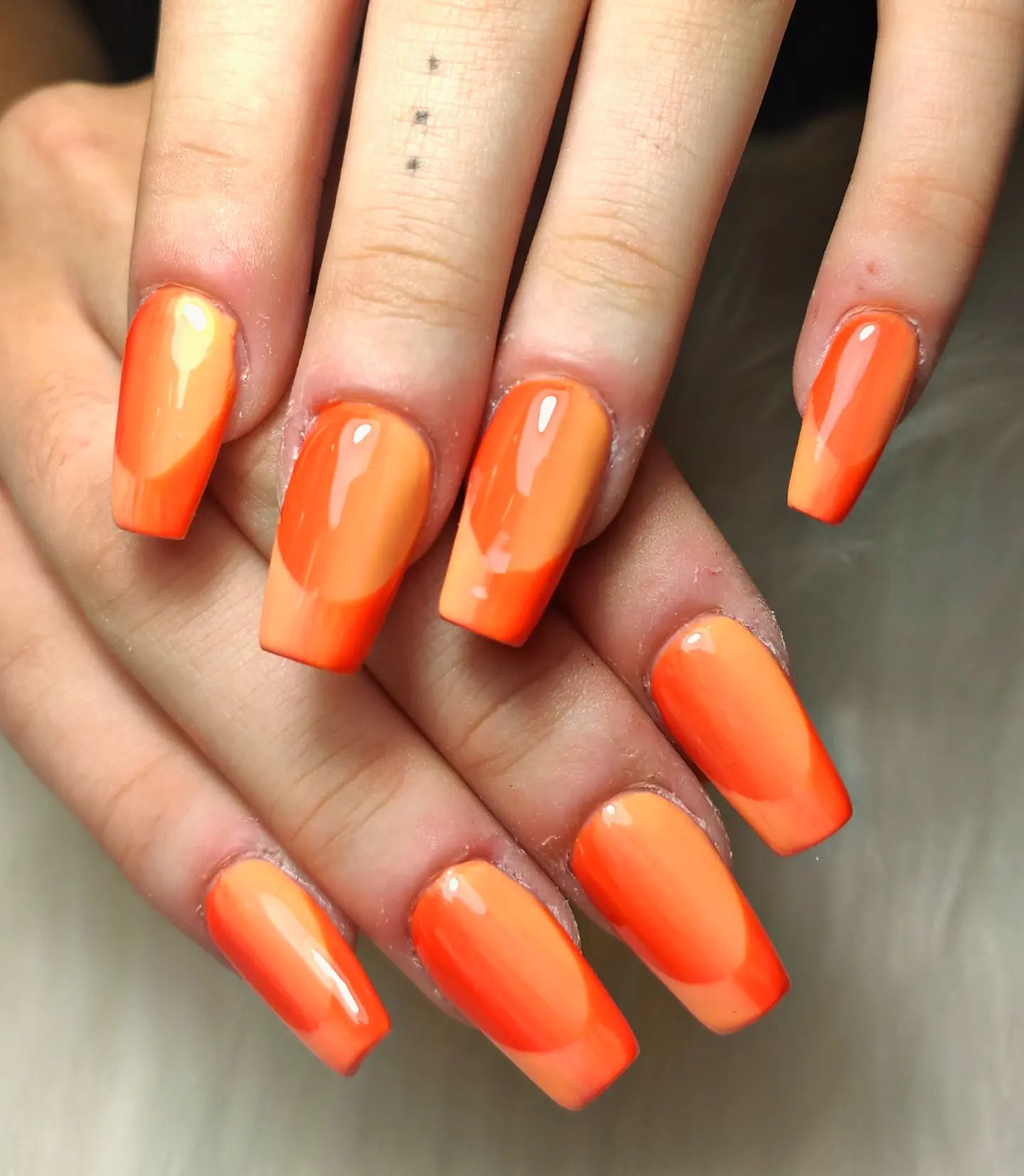 Orange is such a warm and inviting color when it is combined with ballerina nails. The shade can be worn year-round, and it would look great with any outfit. I think it would be especially nice for summertime.