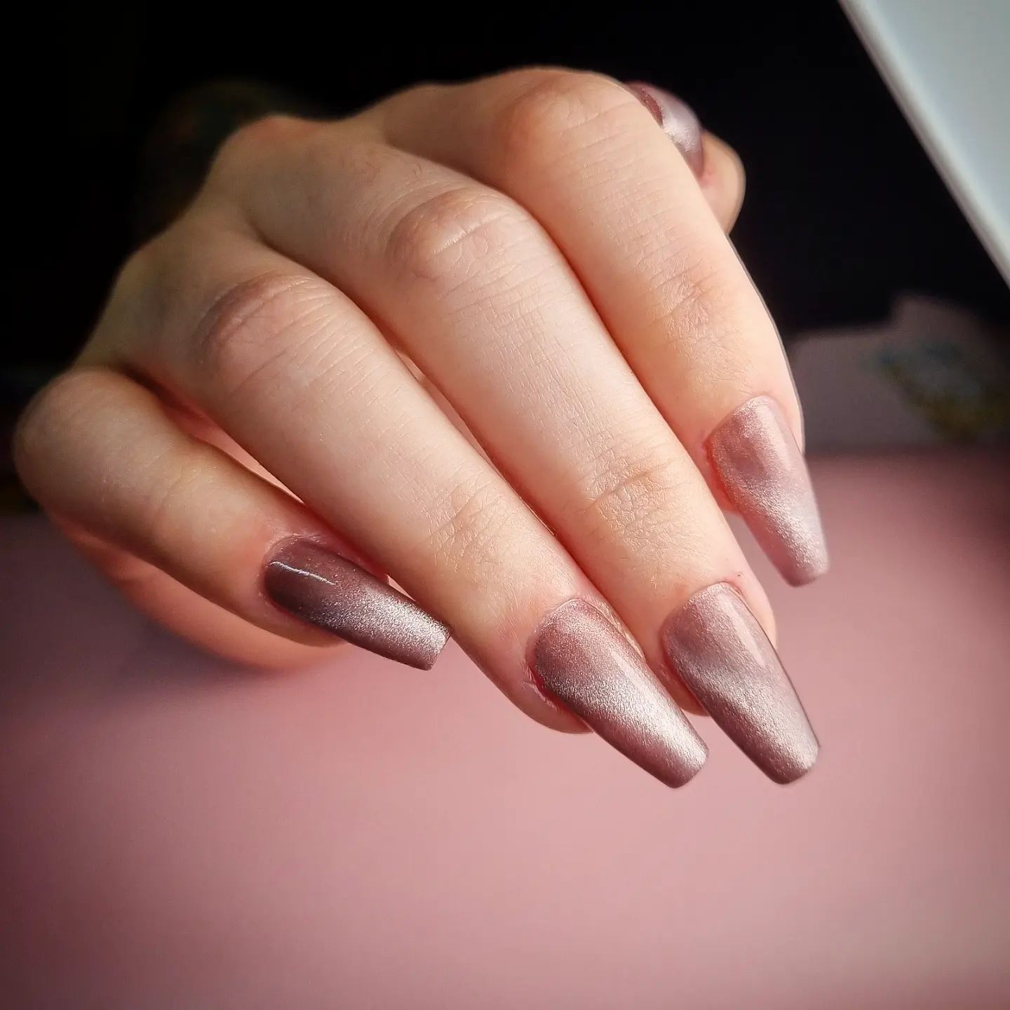 Long square dark pastel nails will give your cat eye nail art a chic look. What are you waiting for?