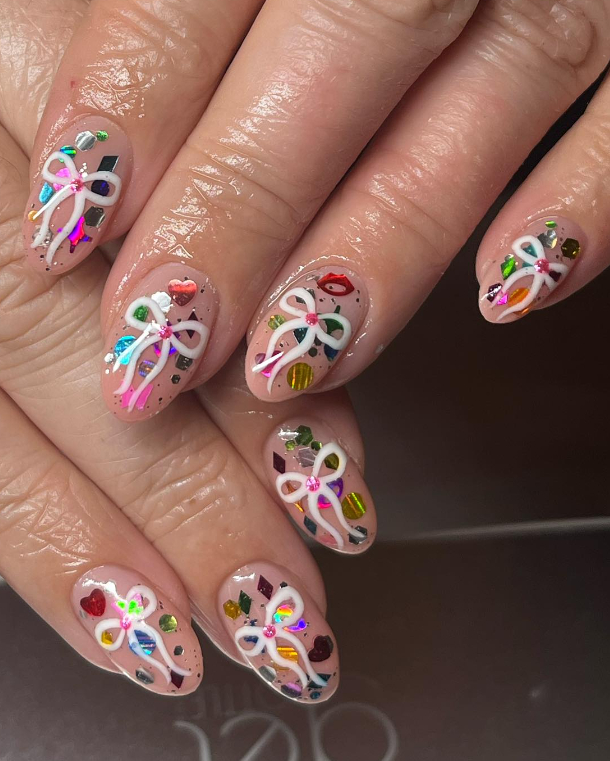 confetti nails with white bows