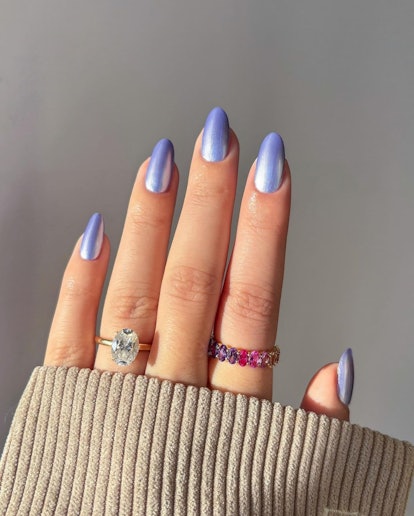 Purple chrome nails are on-trend.