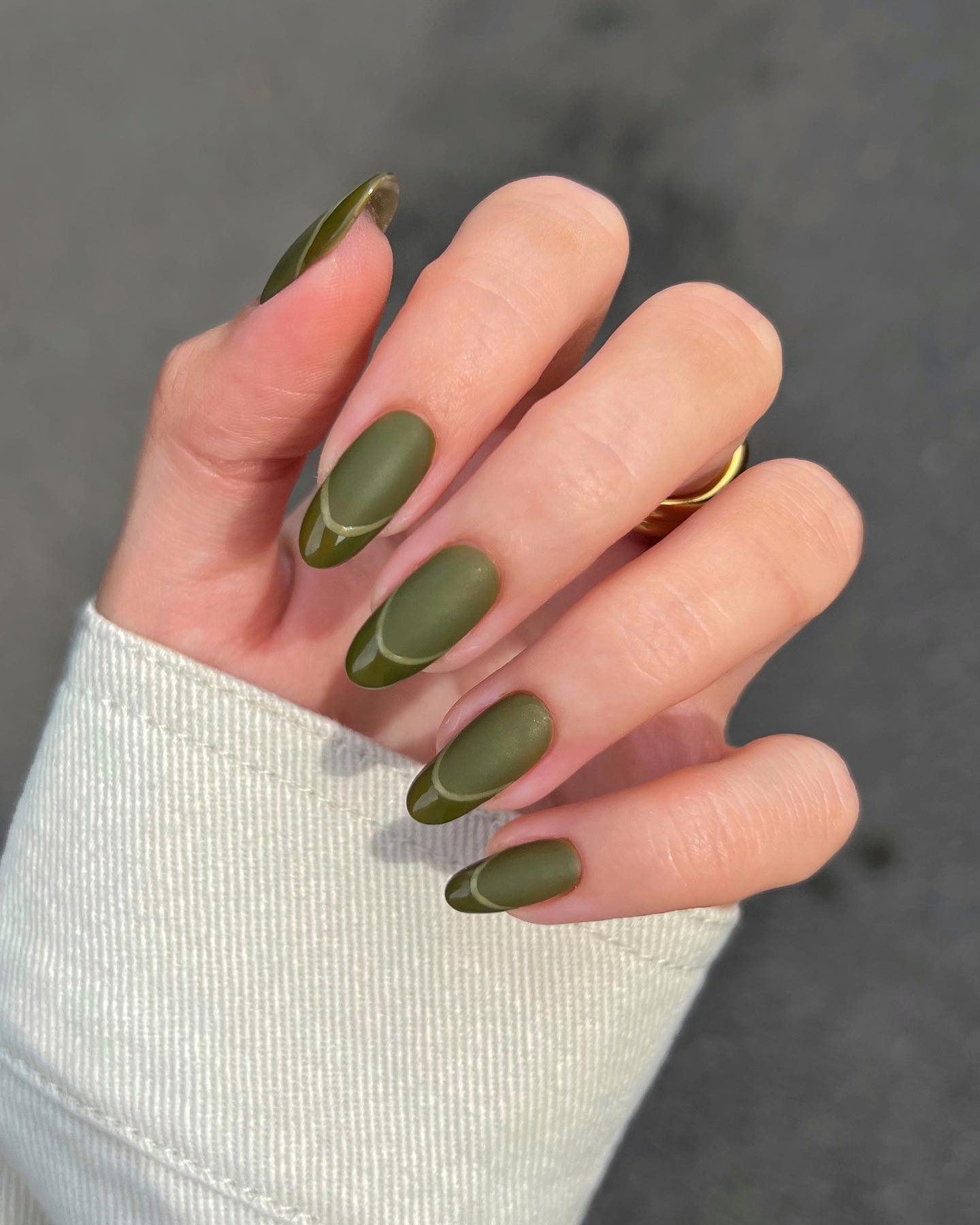 Shiny and matte nail polishes are equally amazing. And you know what? You can combine them together so that you don't have to choose one. For your khaki matte nails, apply a French mani with shiny version of this color on tips.