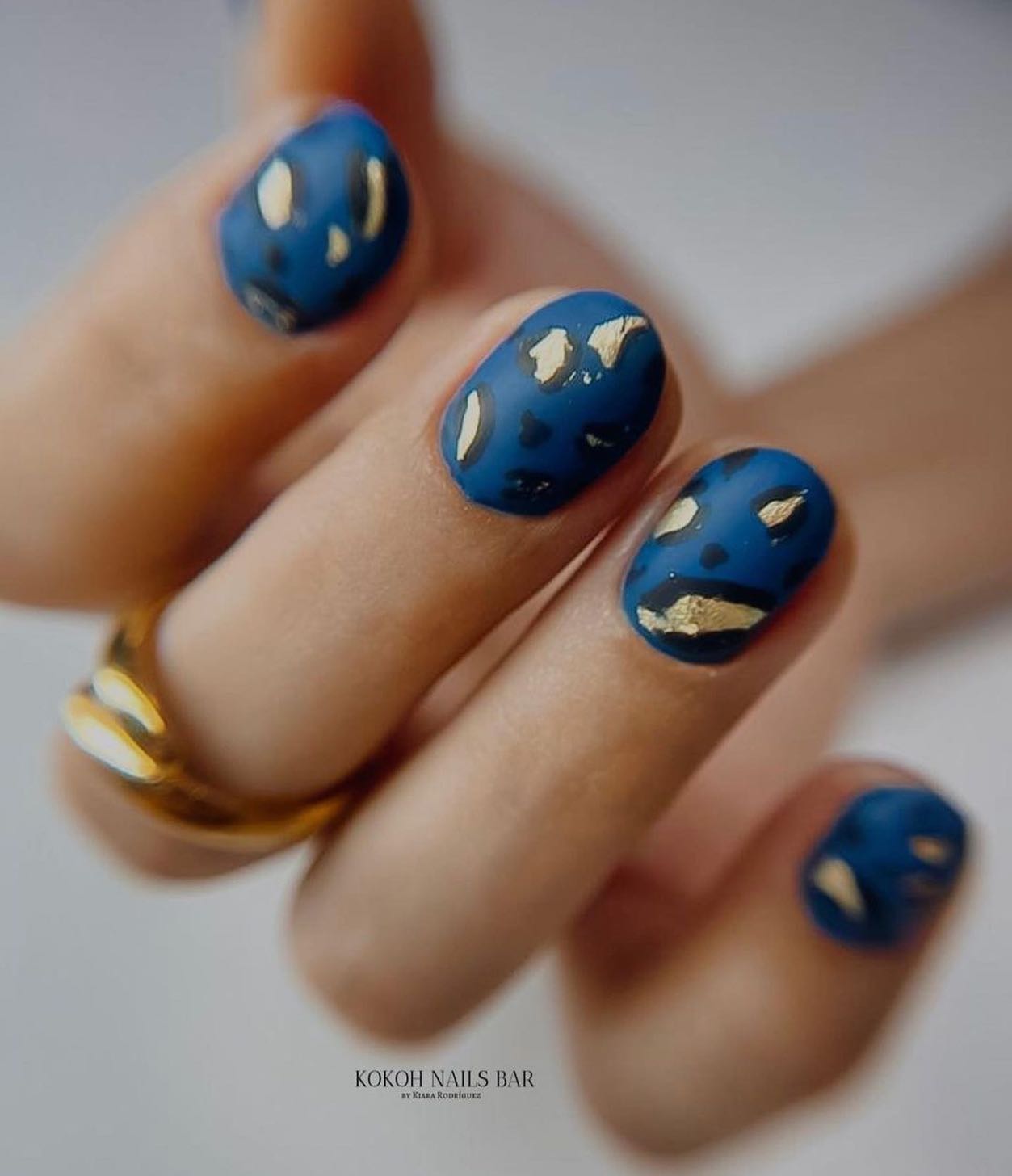 Leopard nail art is a fun way to add a little bit of wildness to your look. It's also a great option if you're looking for something bold. On your blue matte nails, leopard lines stand out in a great way.