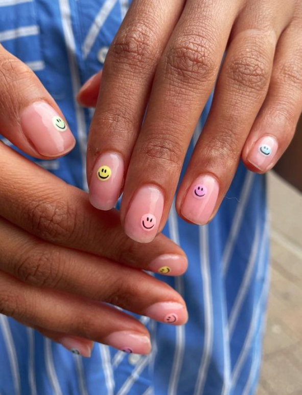 pastel smiley face nails