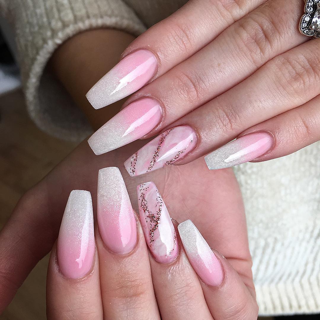 It doesn't matter which season you get glitters on your nails. Because they shine every time and they make you glamorous. The glitters above create the effect of ombre with the pink nail polish. Let's try it out.