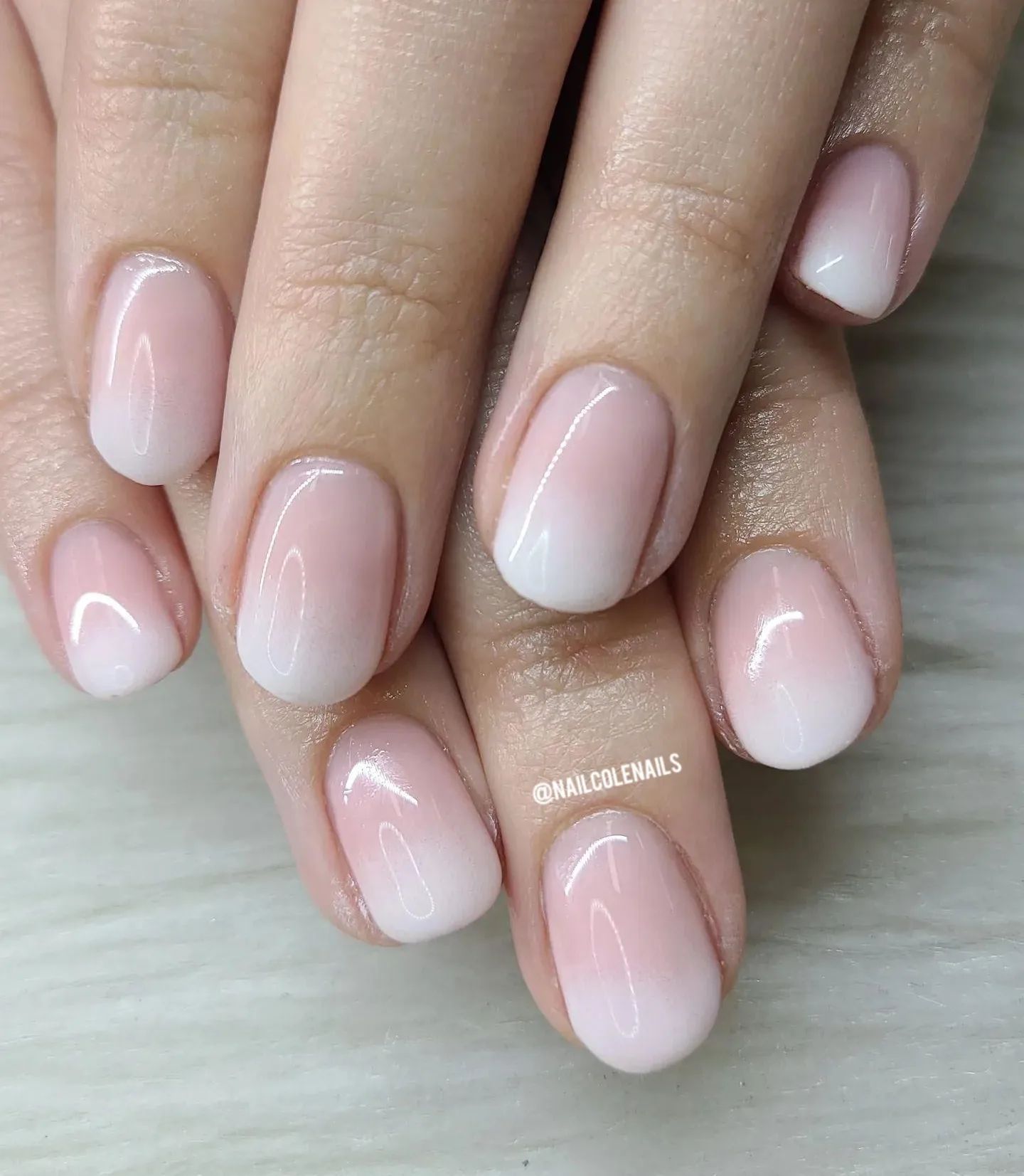 Your short nails can take a whole different look with pink and white. Plus, you don't have to have long nails to look amazing with these. It looks like a white shade is used at the base while the pink one is used in the middle, which gets lighter to the tips.