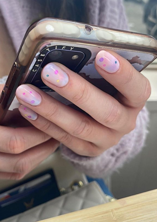 white nails with pastel dots