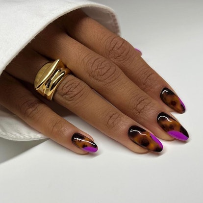 Tortoiseshell nails with pops of color are on-trend.