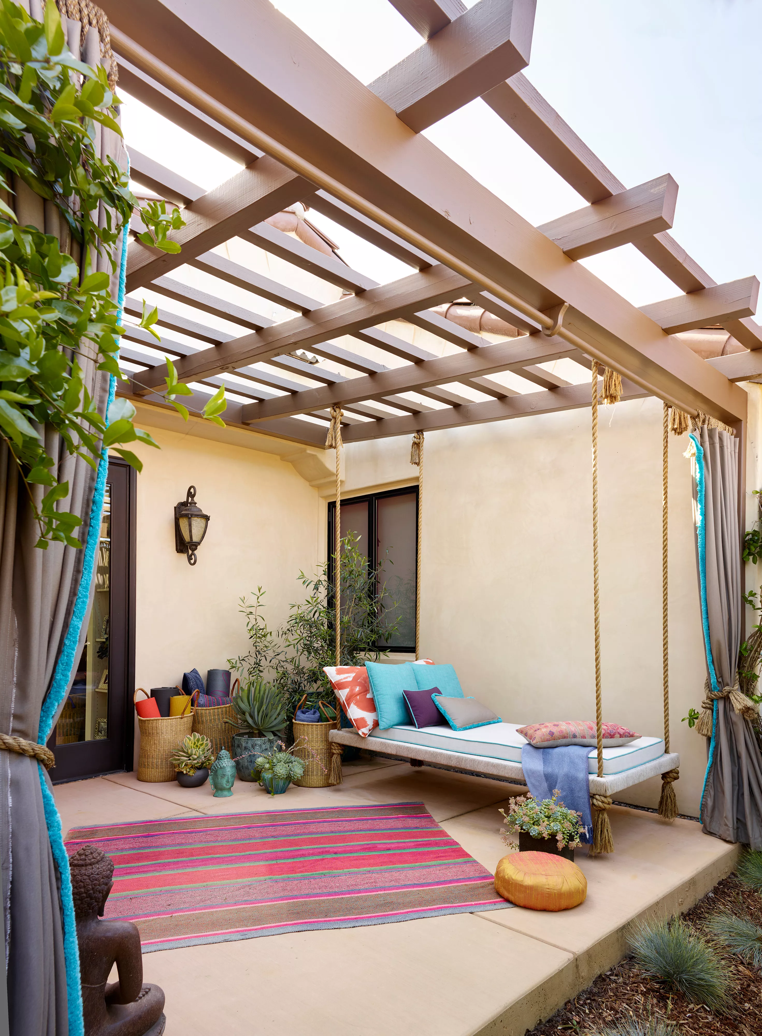 patio with porch swing and yoga area