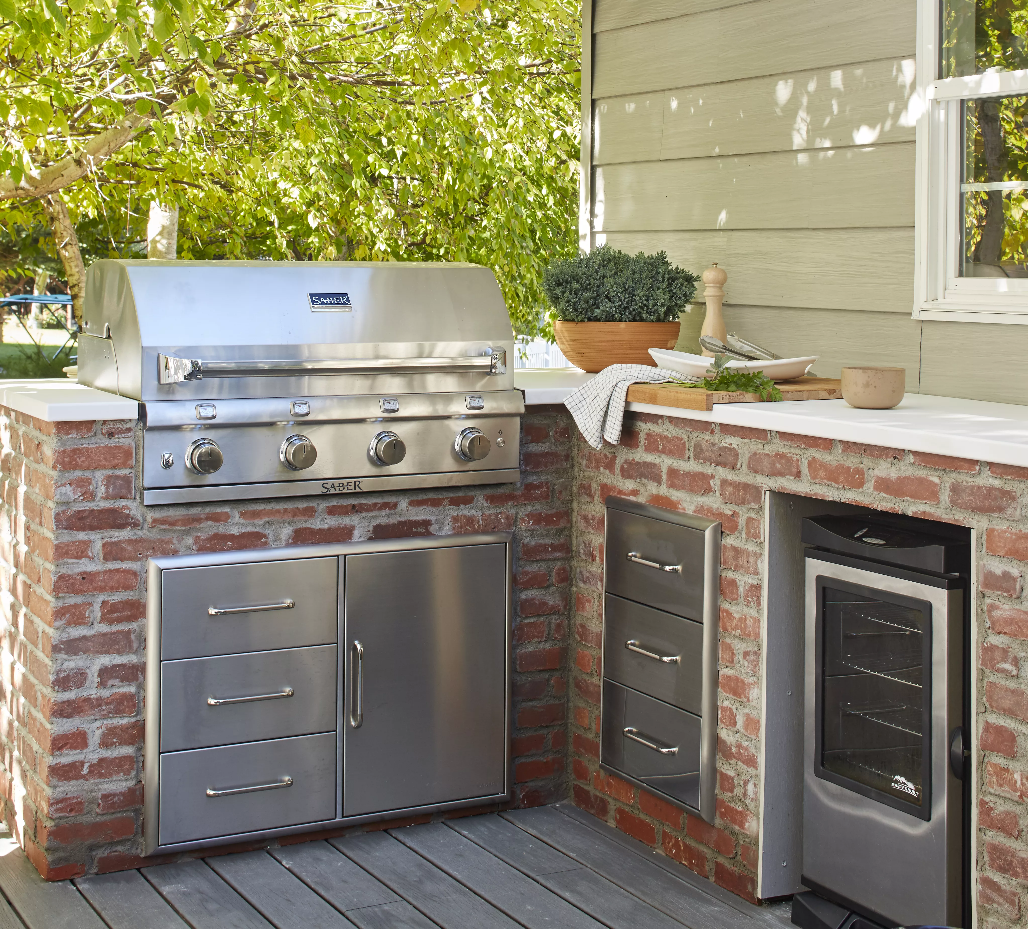 Small outdoor grill station on patio