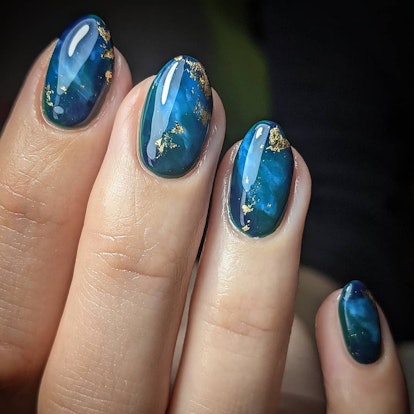 Blue marbled nails are on-trend.