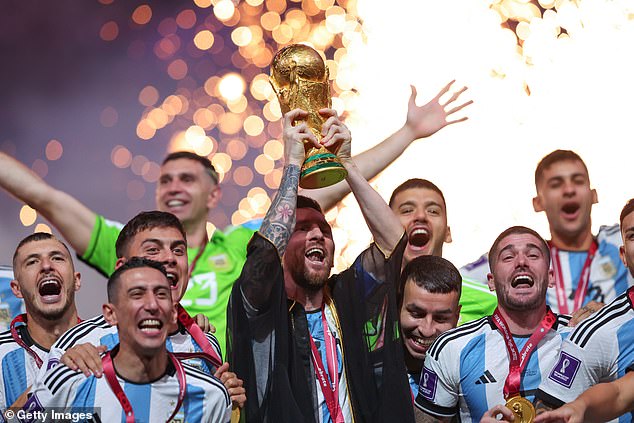 Argentina's players surrounded their talisman and captain as he lifted the trophy to conclude four weeks of football