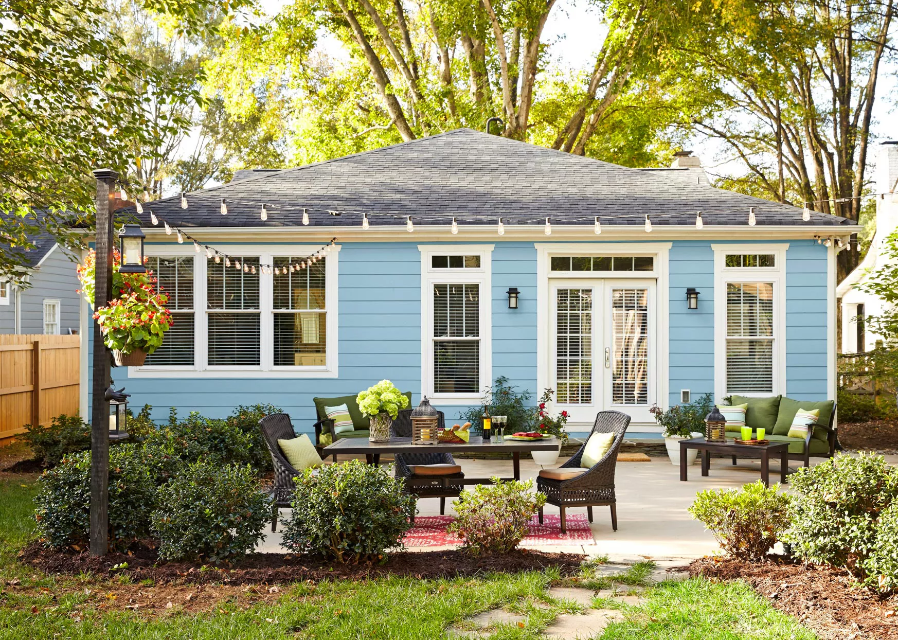 blue house with backyard patio