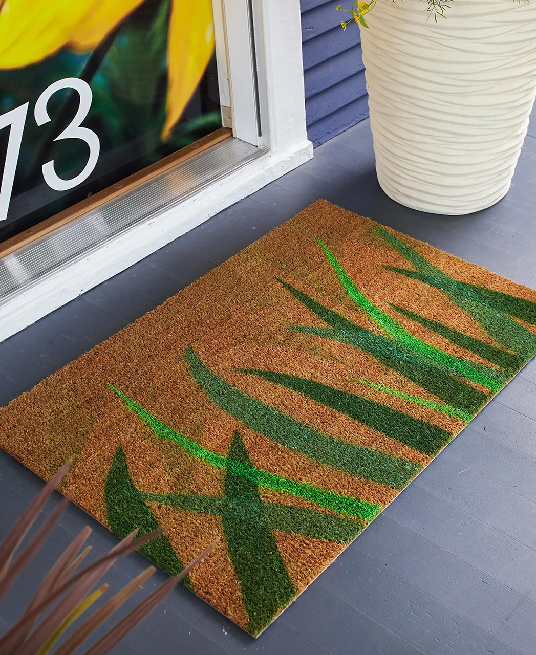 Grass painted welcome mat