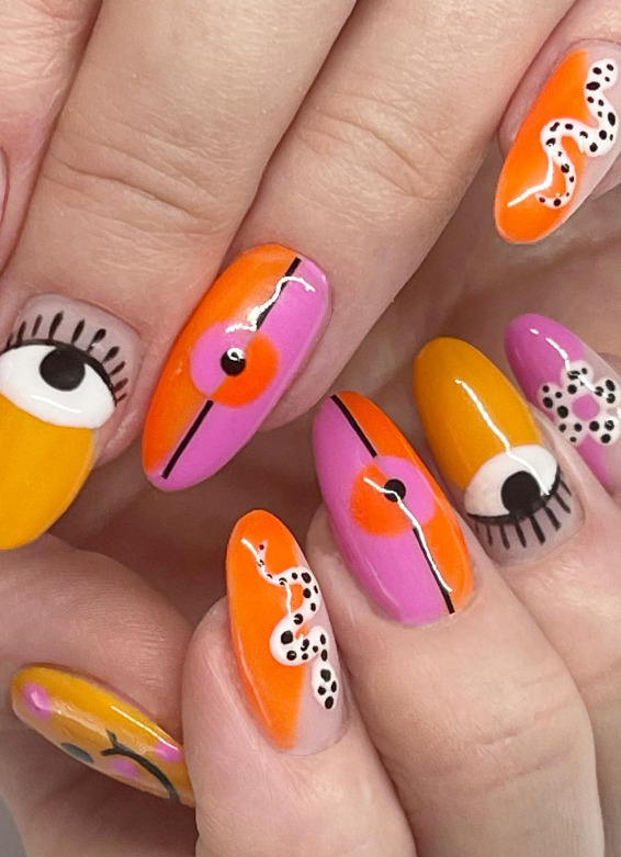 orange and pink mismatched manicure