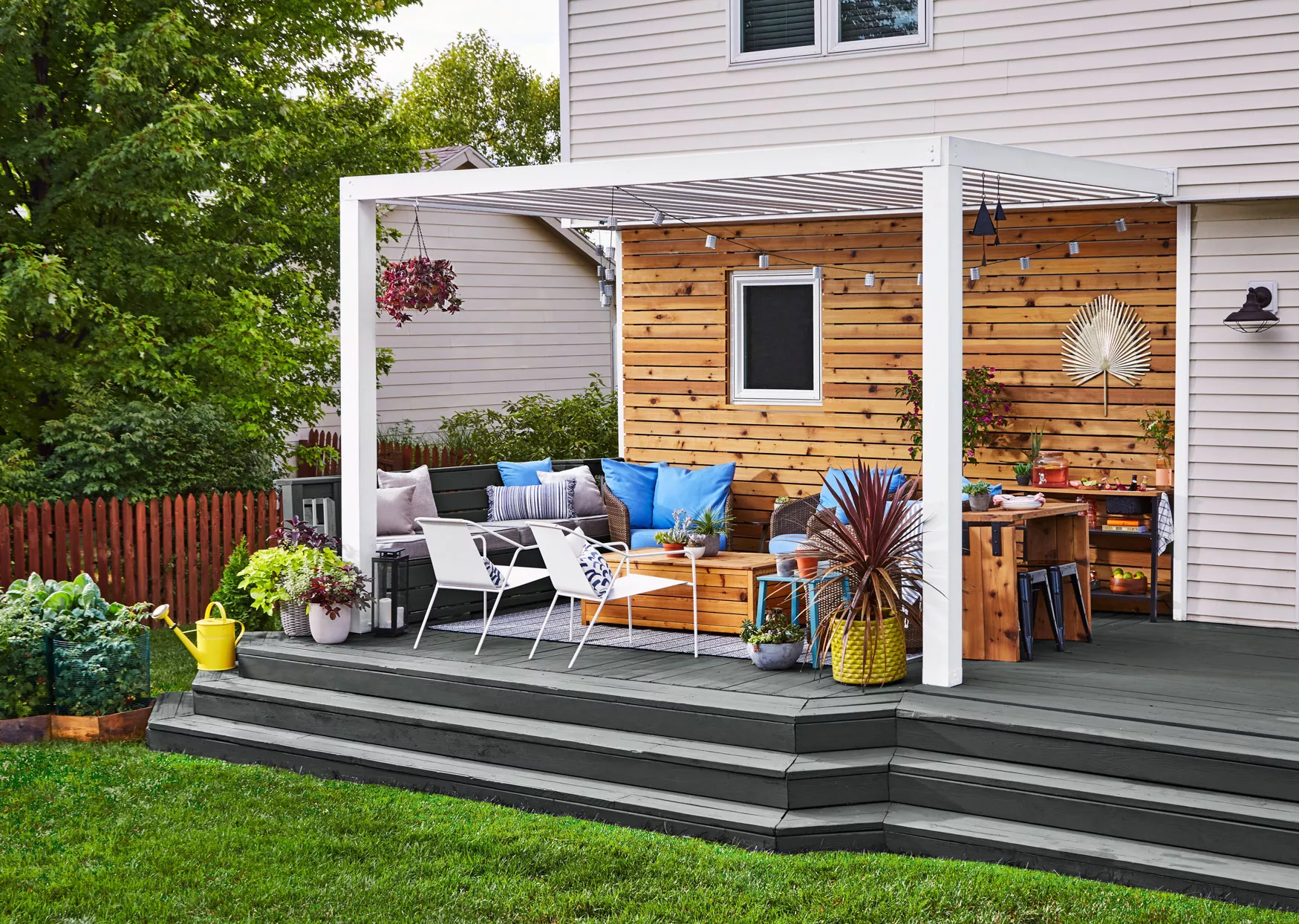 patio with gray deck, light wooden wall, white ceiling