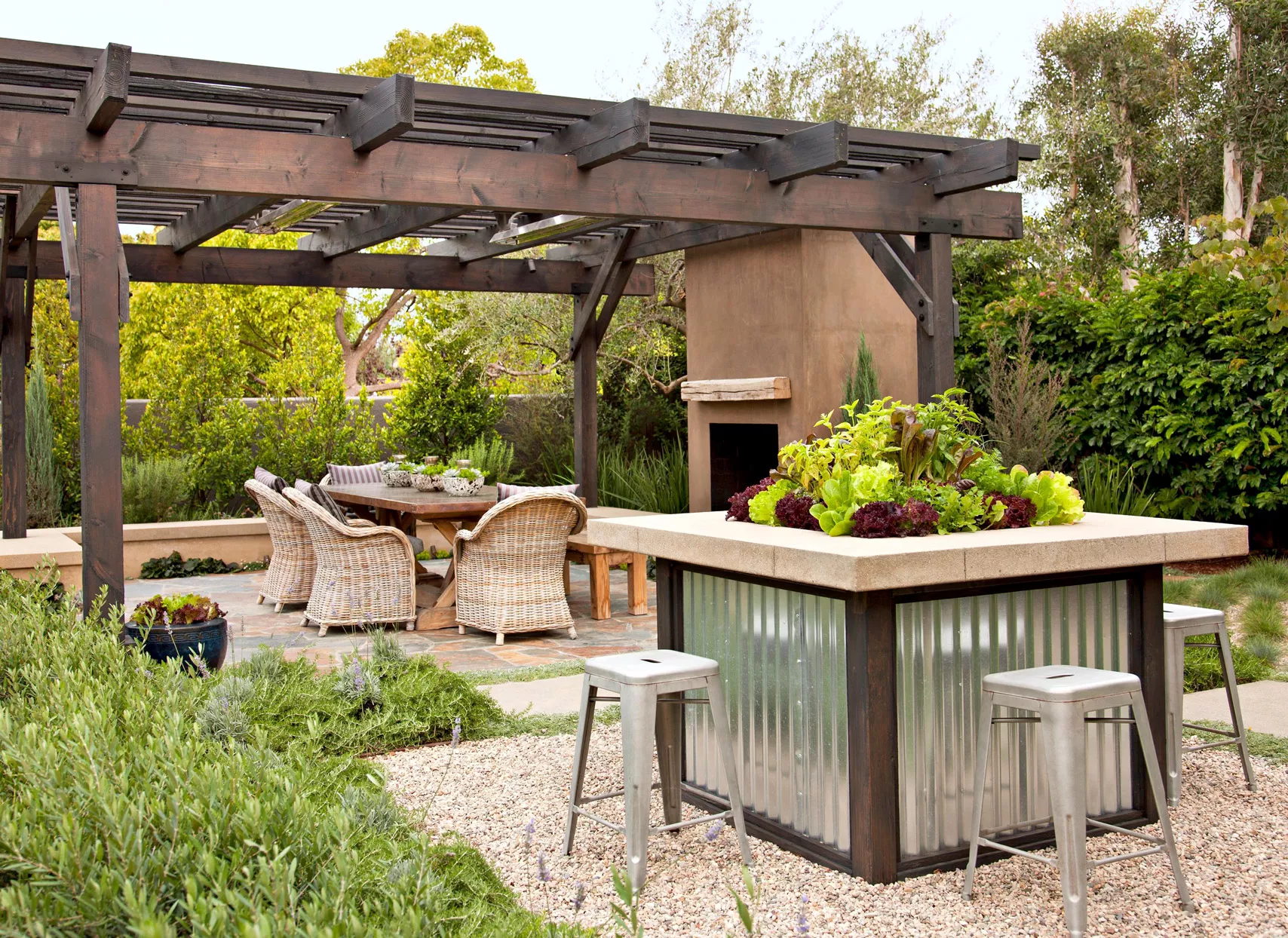 patio with pergola and fireplace