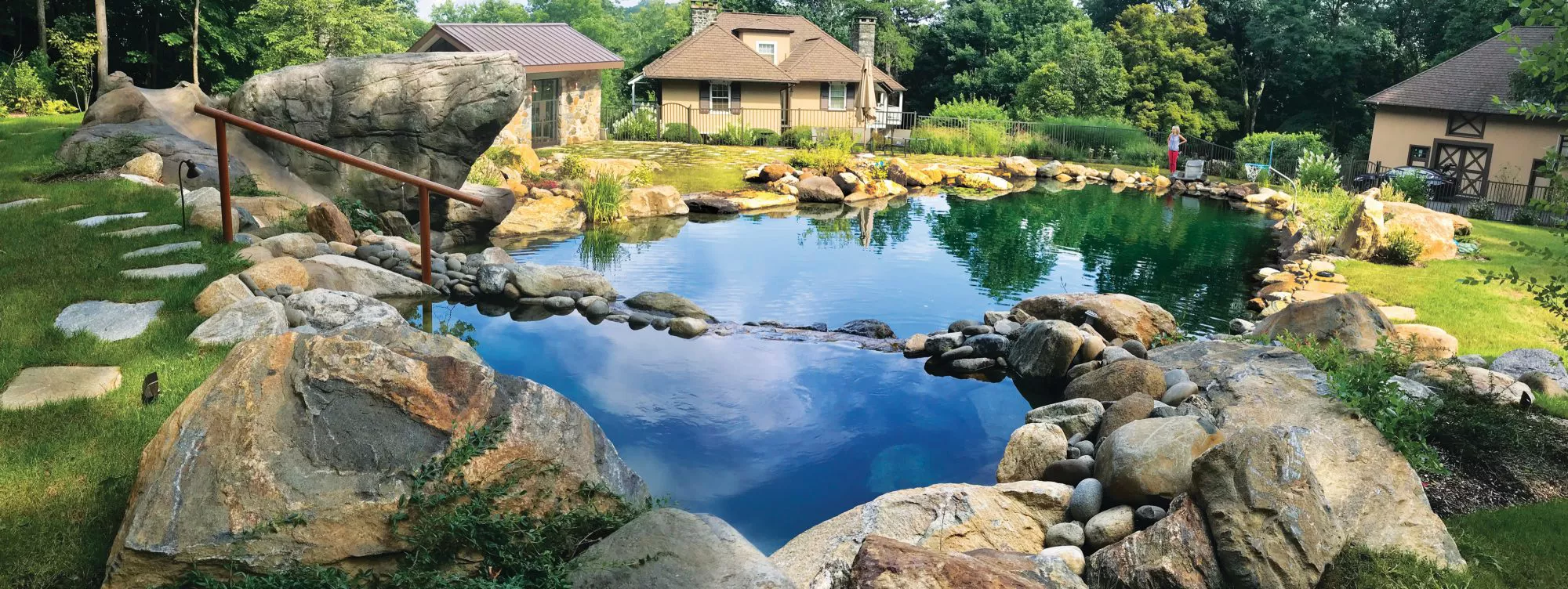 A visual of a naturally made swimming pool.