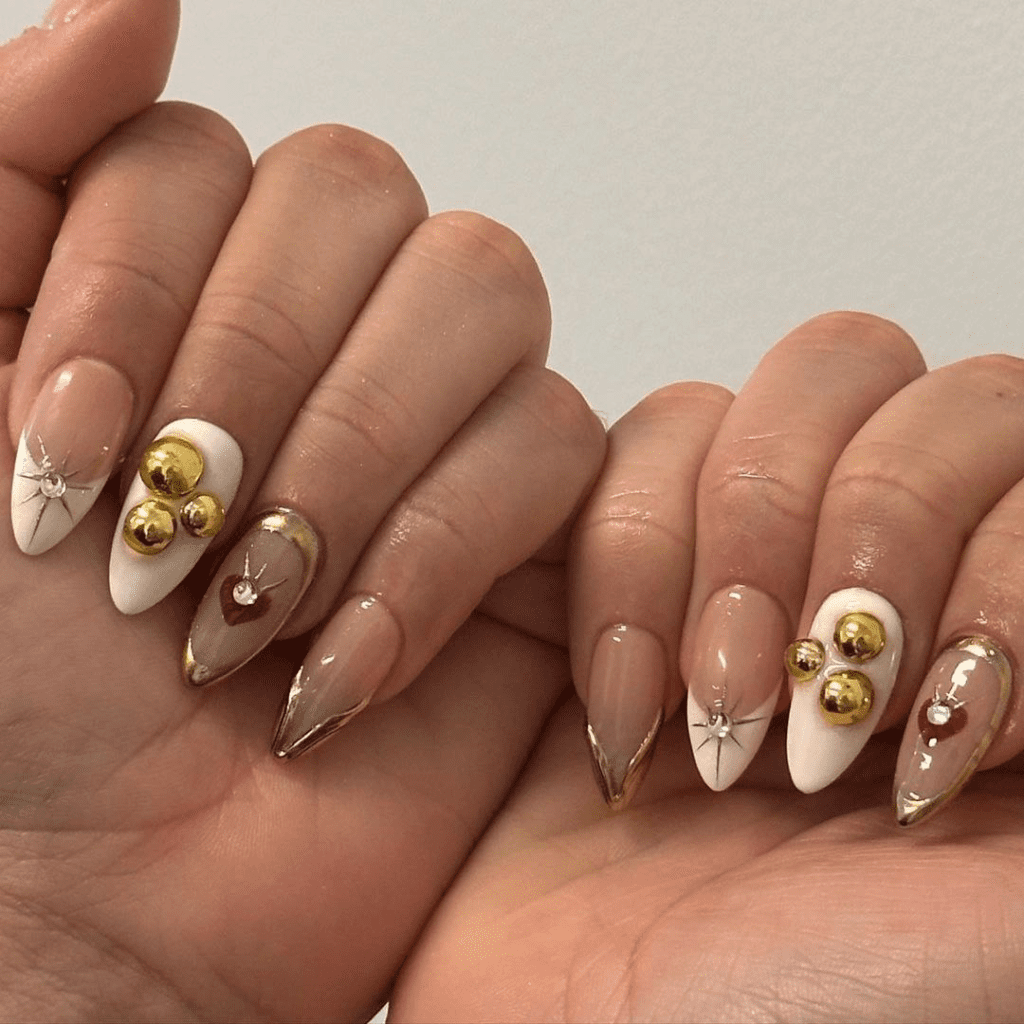 Obsessed with gold? This post will feature 99+ gold nail ideas that are foolproof gold nail designs that drip with luxury. Whether you’re getting ready for a wedding, party, birthday, or just want to feel like a million bucks, we’ve got the perfect gold nail design for you.