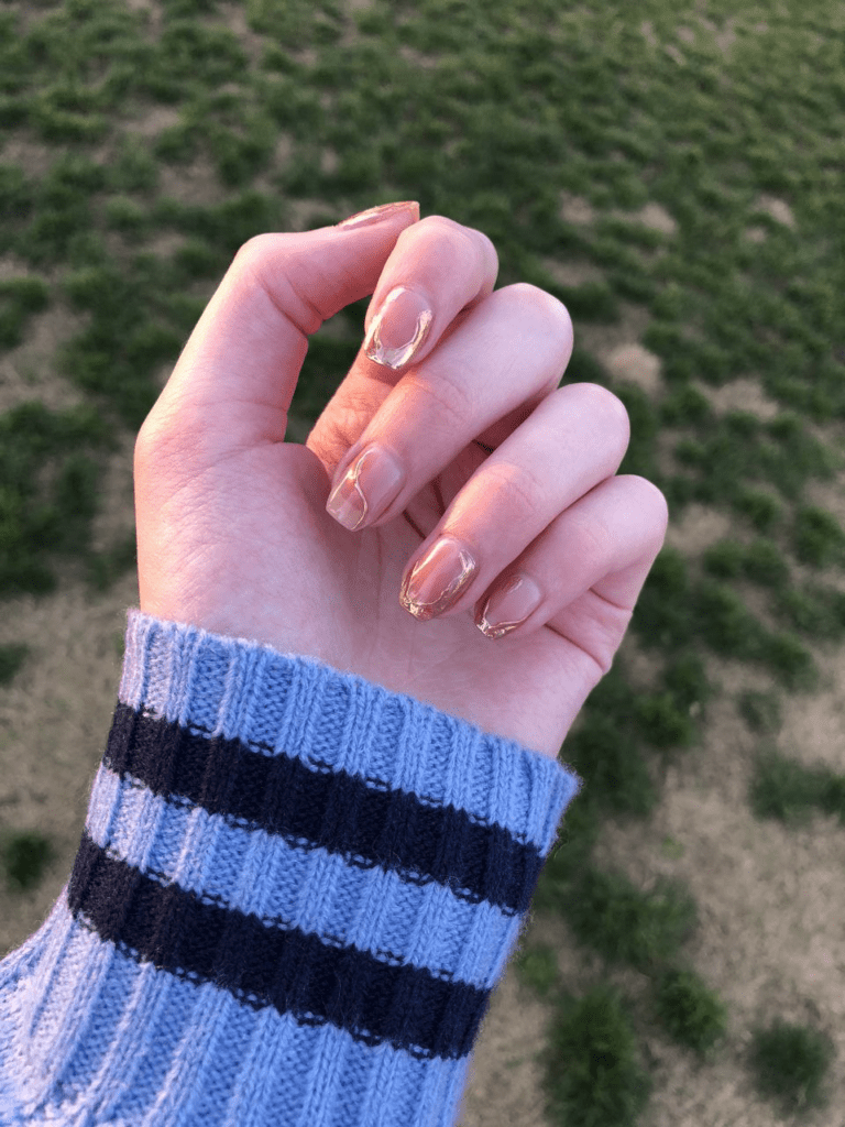 Obsessed with gold? This post will feature 99+ gold nail ideas that are foolproof gold nail designs that drip with luxury. Whether you’re getting ready for a wedding, party, birthday, or just want to feel like a million bucks, we’ve got the perfect gold nail design for you.