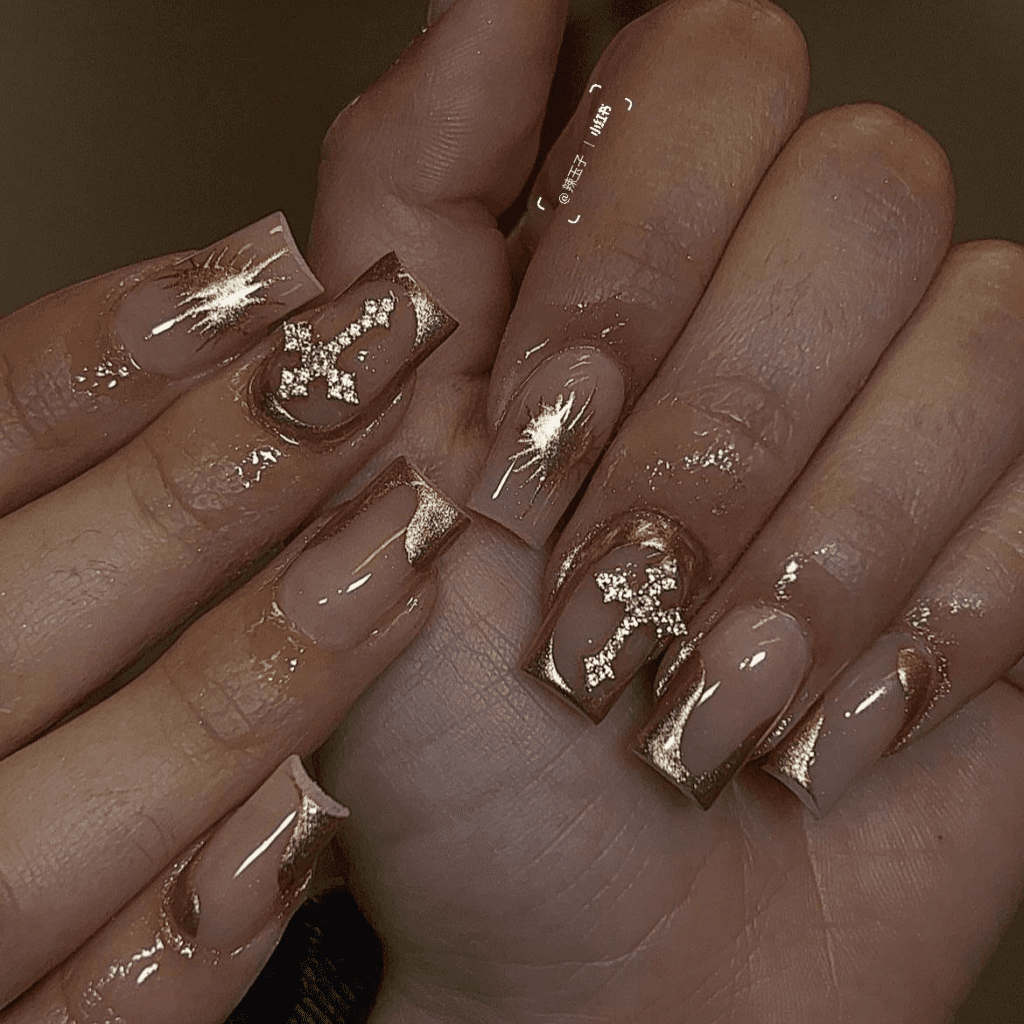 Obsessed with gold? This post will feature 99+ gold nail ideas that are foolproof gold nail designs that drip with luxury. Whether you’re getting ready for a wedding, party, birthday, or just want to feel like a million bucks, we’ve got the perfect gold nail design for you.