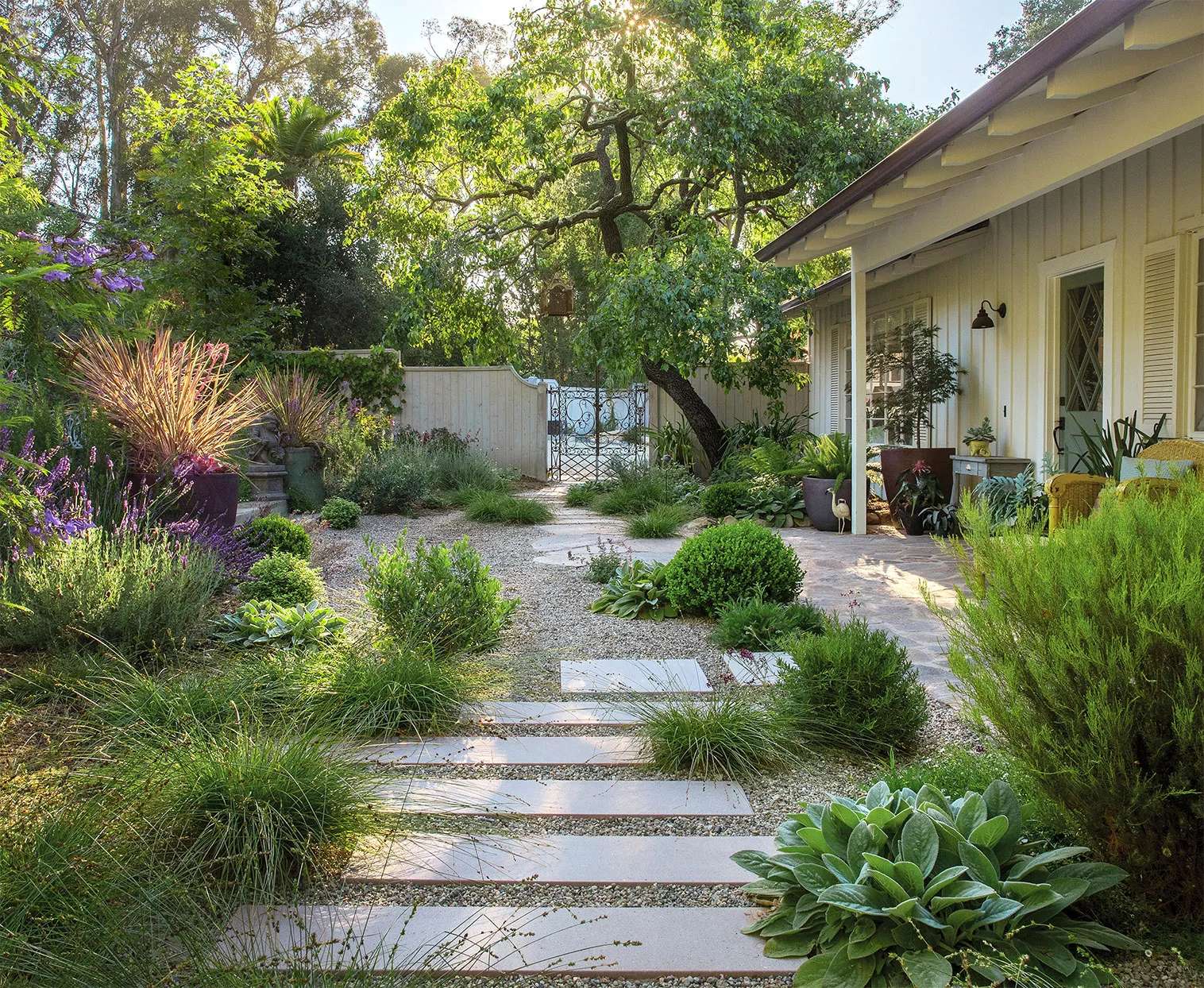 backyard garden gravel concrete pavers grasses